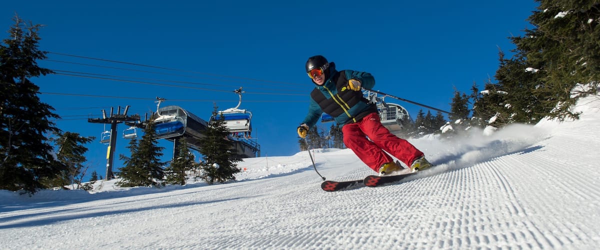 Mount Snow featuring snow, snow skiing and a gondola