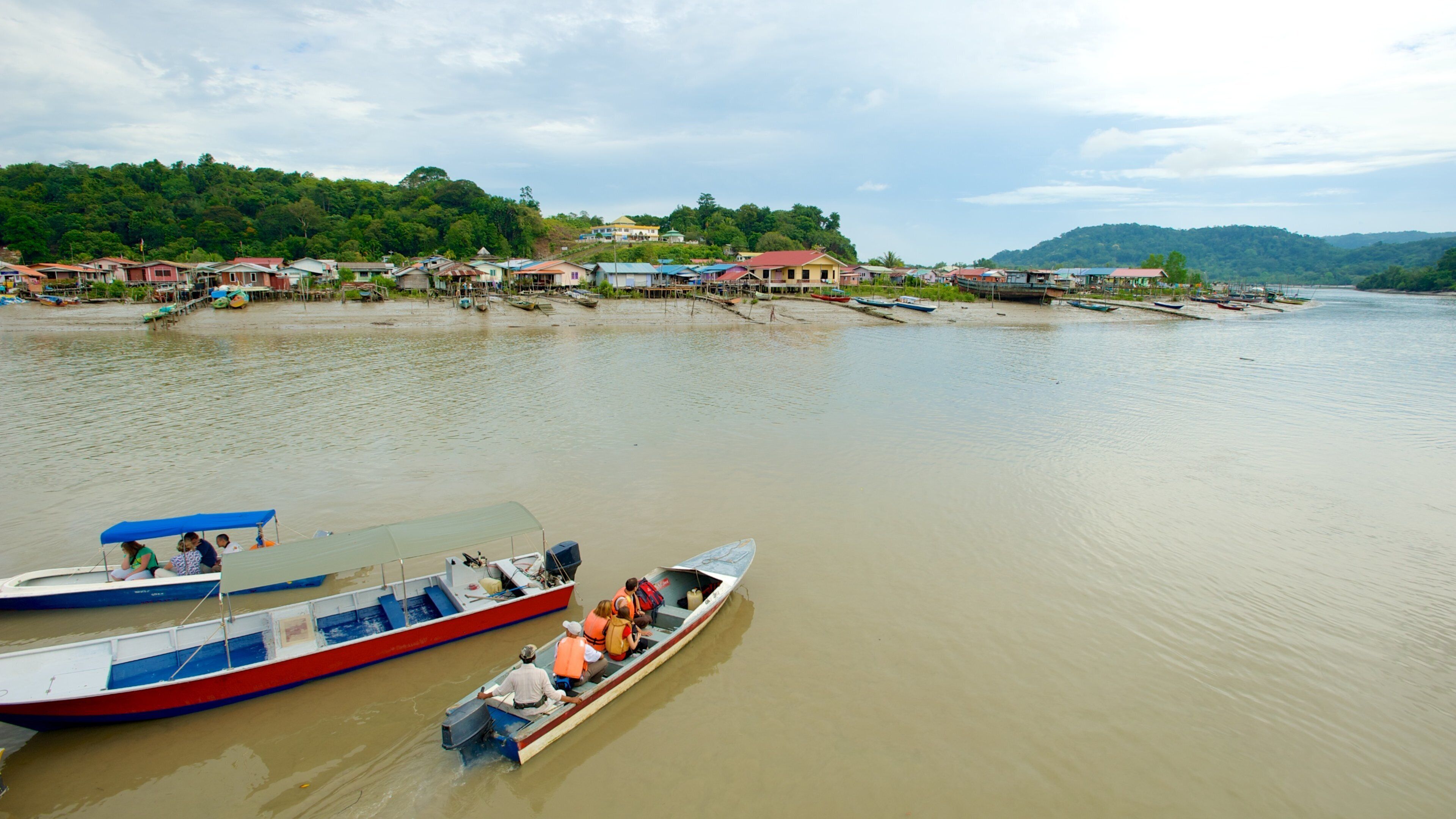 Bako National Park featuring a bay or harbour, boating and a coastal town