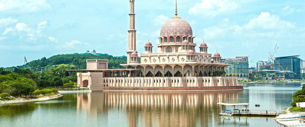 Putra Mosque showing a bay or harbor, heritage architecture and a mosque