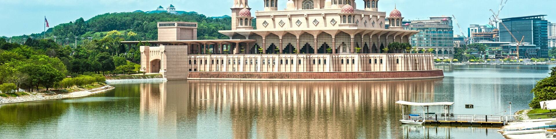 Putra Mosque showing a bay or harbor, heritage architecture and a mosque