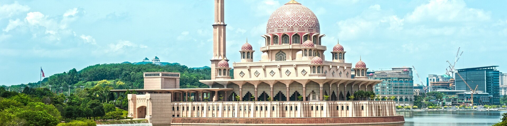 Putra Mosque showing a bay or harbor, heritage architecture and a mosque