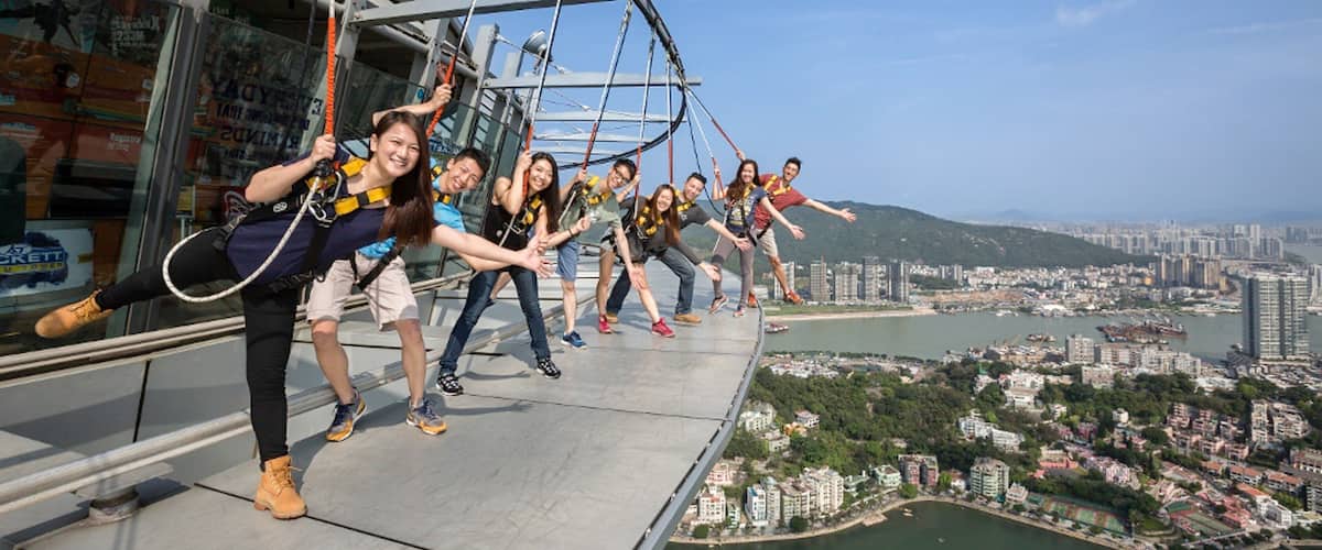 Macau Tower showing bungee jumping as well as a small group of people