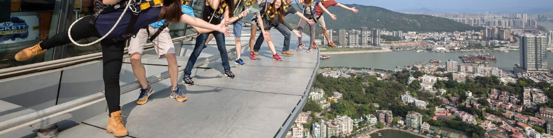 Macau Tower showing bungee jumping as well as a small group of people