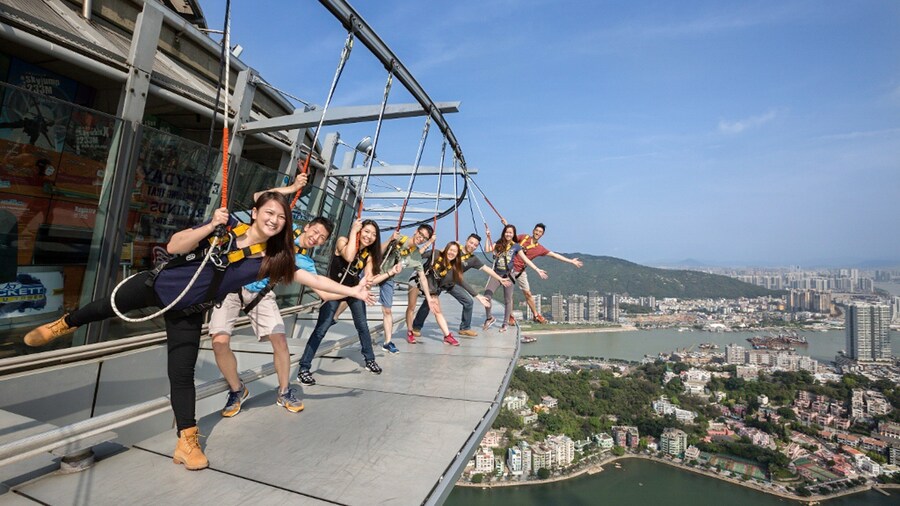 Macau Tower showing bungee jumping as well as a small group of people