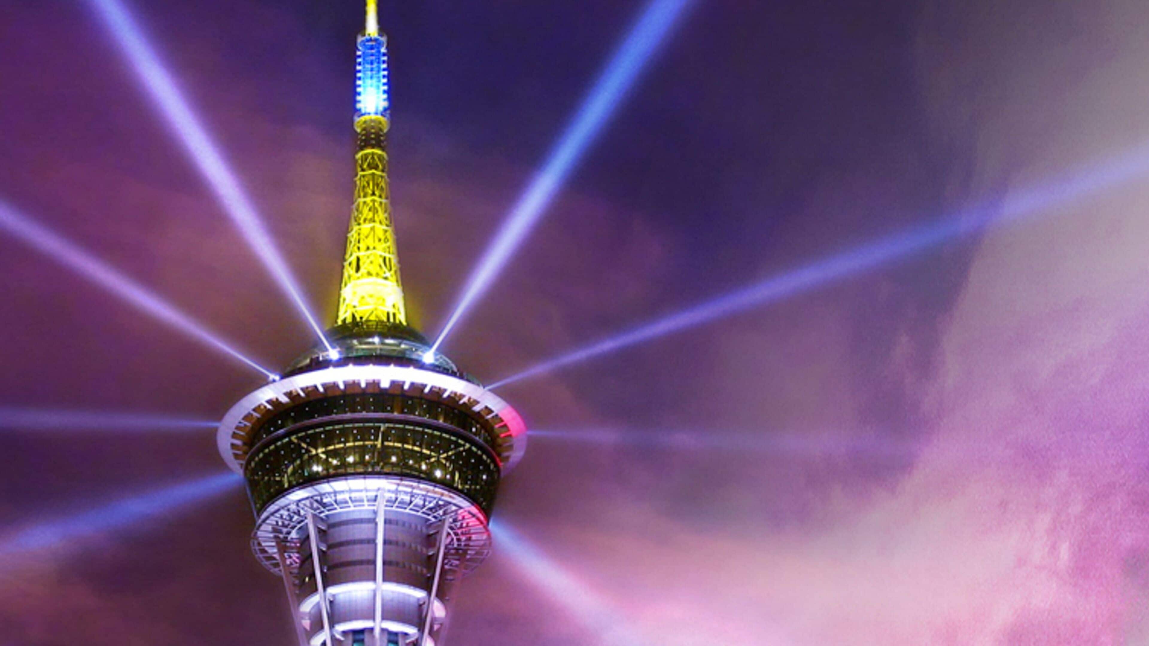 Macau Tower which includes night scenes