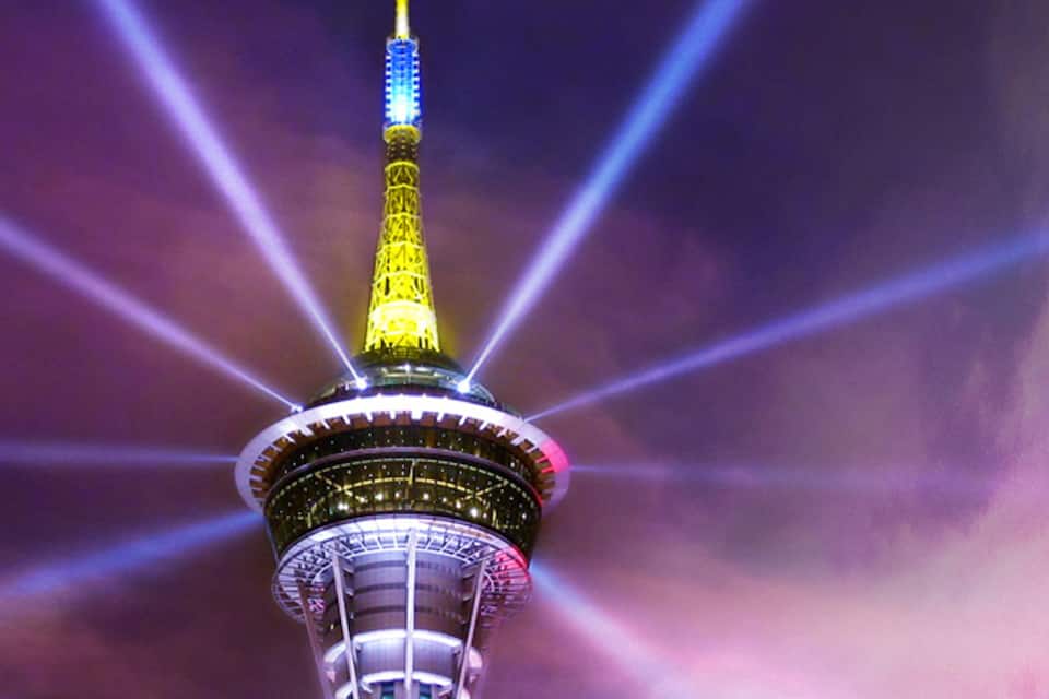 The Tokyo Tower with its illuminated spire and surrounding lights.