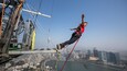 Macau Tower which includes a city and bungee jumping as well as an individual femail