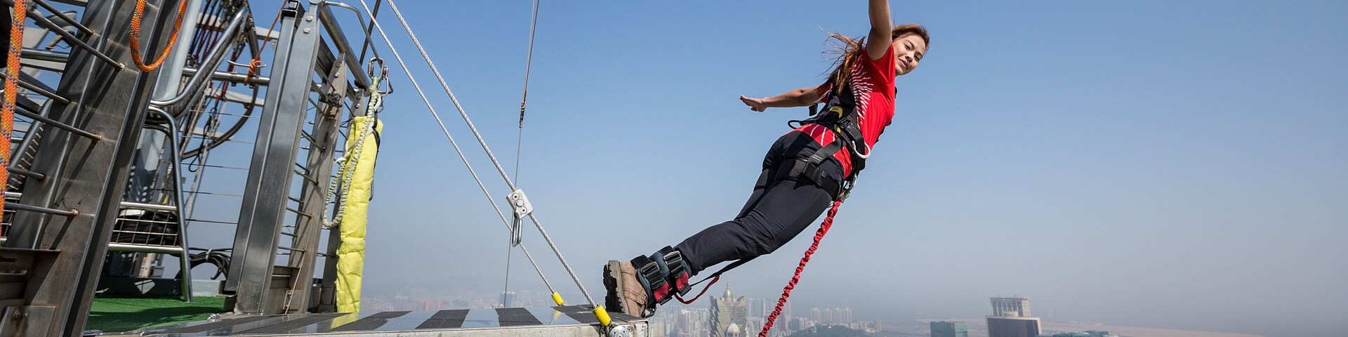 Macau Tower which includes a city and bungee jumping as well as an individual femail