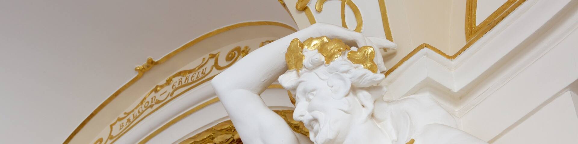 State Theatre featuring a statue or sculpture and interior views