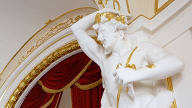 State Theatre featuring a statue or sculpture and interior views