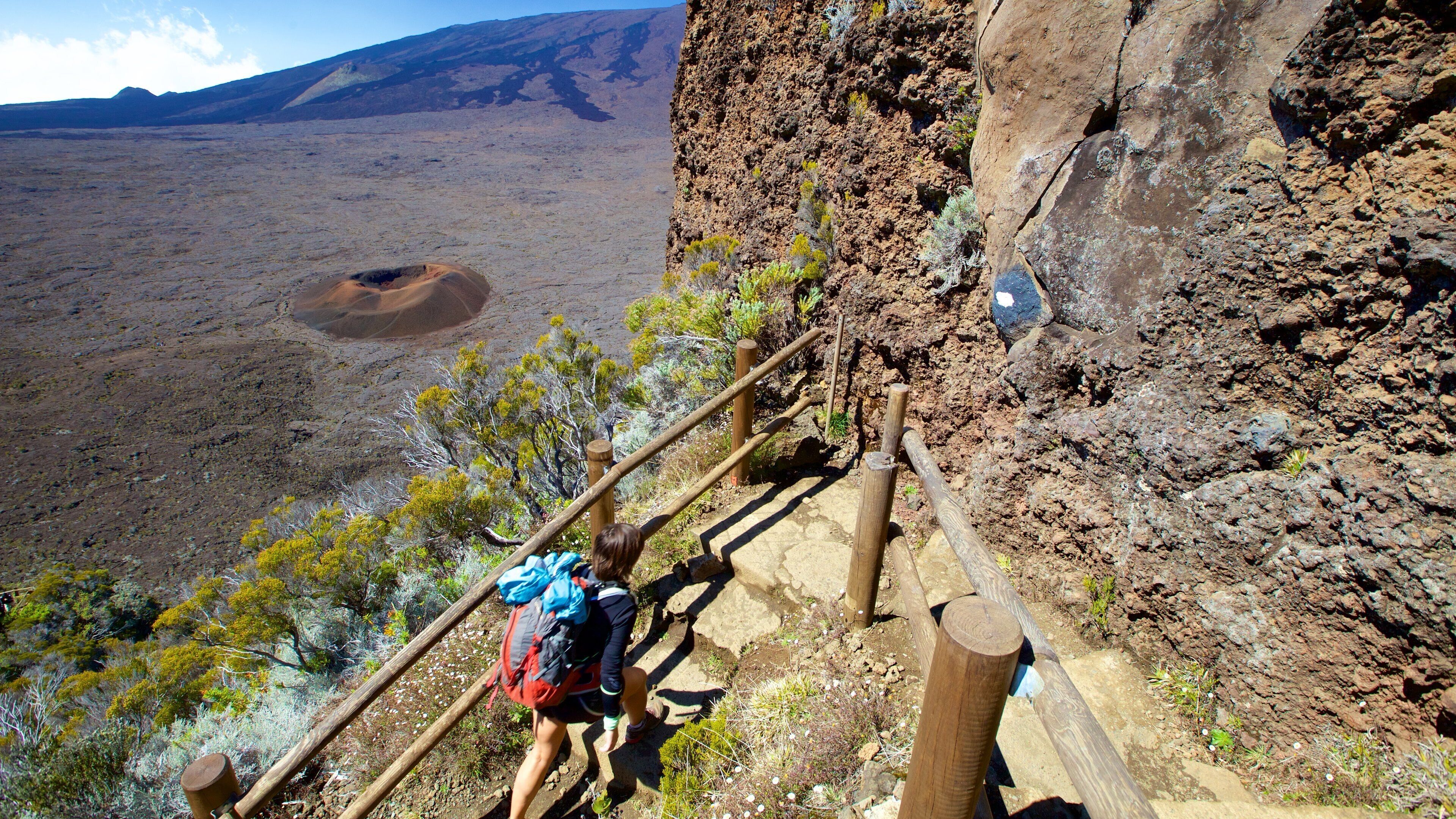 Piton de la Fournaise showing hiking or walking, desert views and tranquil scenes