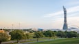 view of the aspire zone park with the view khalifa stadium and the aspire tower in the background.