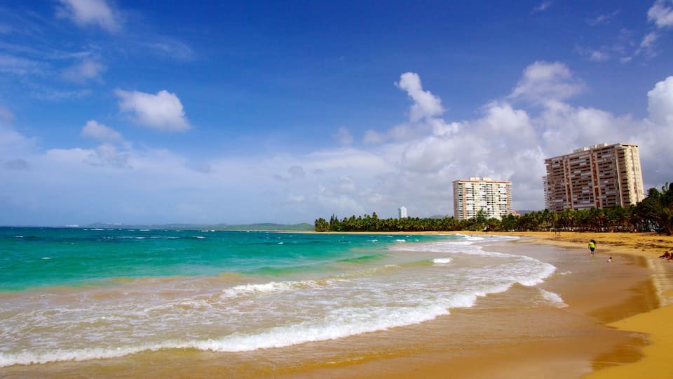 Relaxing day by the turquoise waves at Azul Beach in Luquillo, Puerto Rico with soft sands and lush palm trees