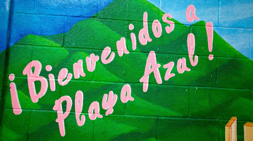 Azul Beach showing signage and outdoor art