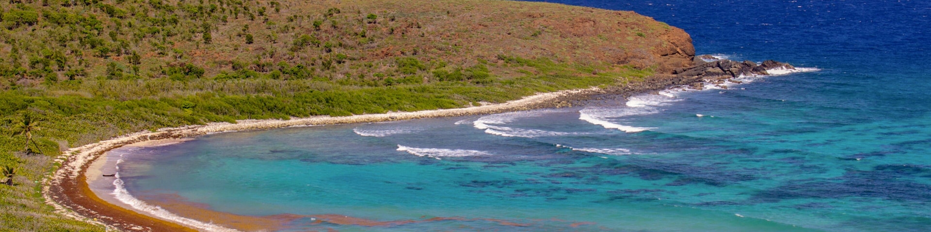 Beach with waves on Culebrita Island by Culebra, Puerto Rico
