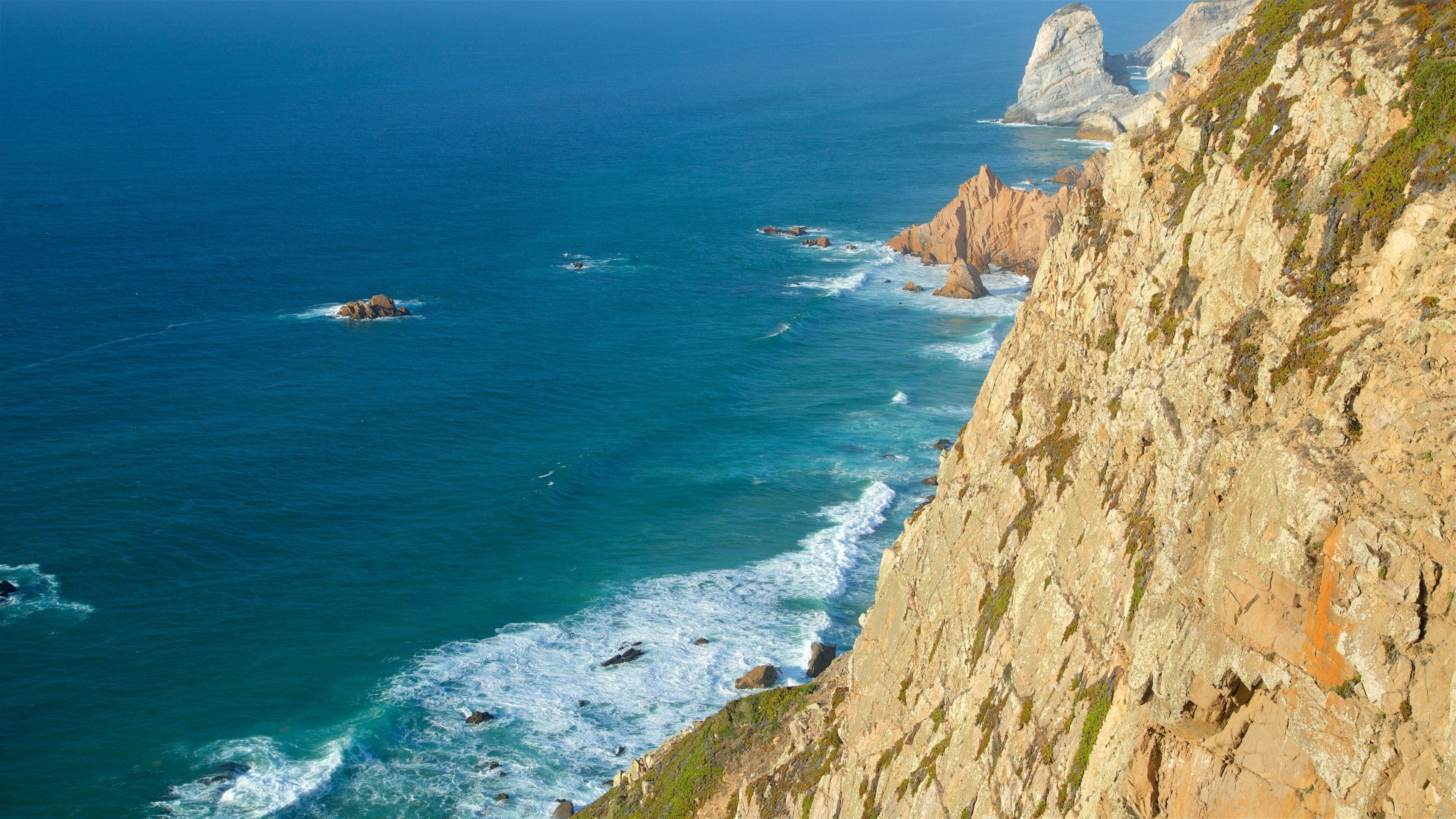 Cape Roca which includes rugged coastline and general coastal views
