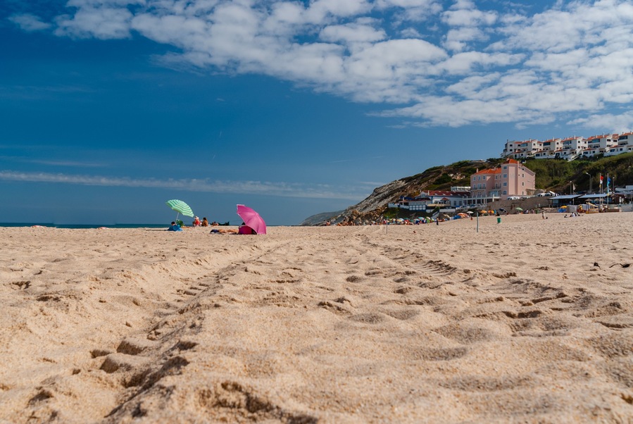 Rest on the sand beach. Summer photo near sea. Beach on Foz do Arelho, Portugal, Shutterstock ID 1072252235, Purchase Order: -