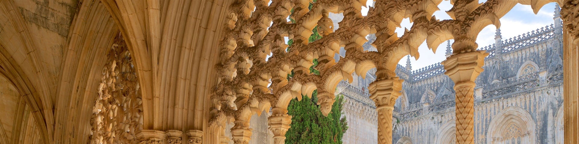 Batalha Monastery featuring a garden and heritage elements