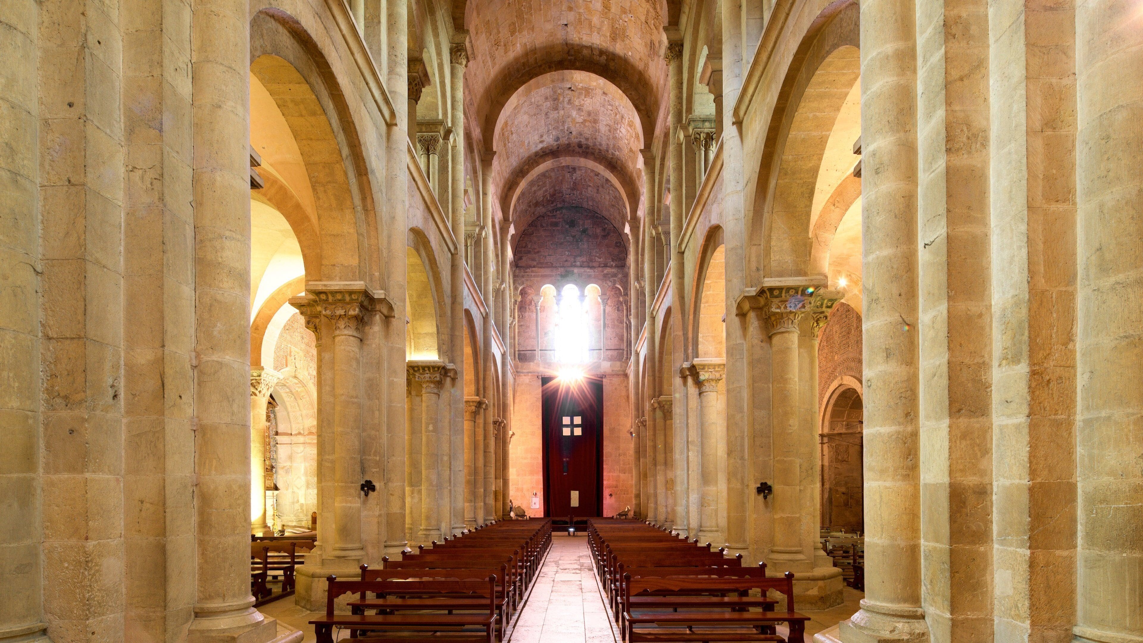 Old Cathedral of Coimbra featuring heritage elements, interior views and a church or cathedral