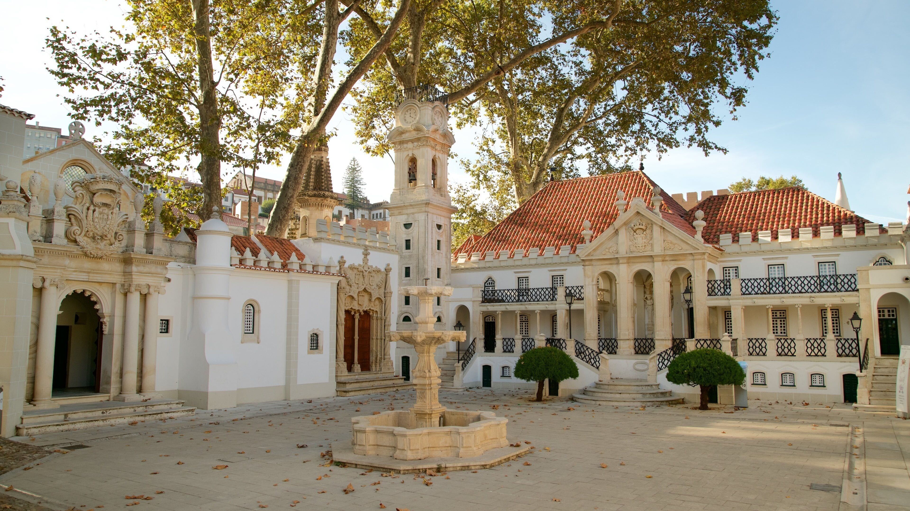Portugal dos Pequenitos showing a fountain and a square or plaza