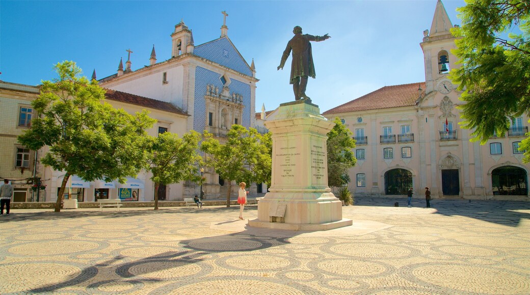 Praca da Republica which includes a statue or sculpture and a square or plaza