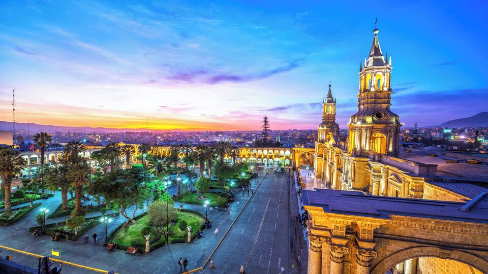 Night falling on the Plaza de Armas in the historic center of Arequipa, Peru
