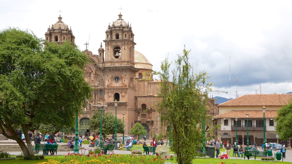 Plaza de Armas featuring a garden and a church or cathedral