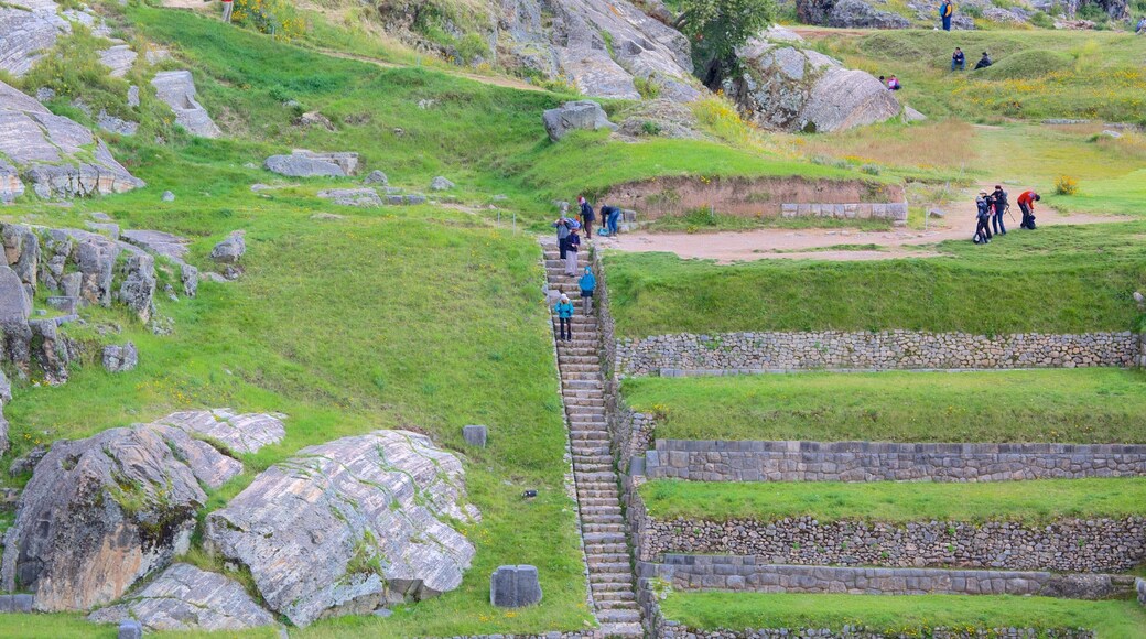 Sacsayhuaman featuring hiking or walking and heritage elements