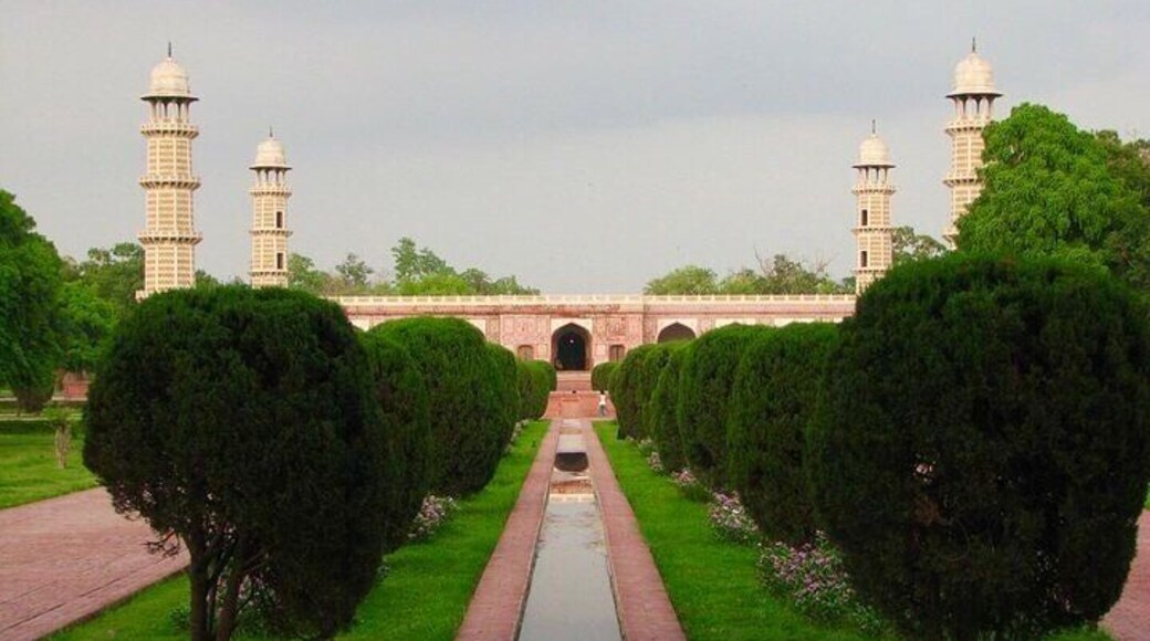 Emperor Jahangir's tomb, a single storey structure, square in plan, consists of a platform with tall octagonal corner towers and a projecting entrance bay in the middle of each side. The exterior of the monument including the lowest stage of the towers, has a red sandstone facing with rich panel decoration inlaid with marble decorative motifs. The interior is embellished with floral frescoes, delicate inlay work and brilliant marble intersia of various colours. The marble cenctaph with its delicate and colourful pietra dure is engraved with the ninety-nine attributes of God.
The tomb was also enriched with precious stones which were removed, like many other places in Lahore associated with Muslim historic sites, by the Sikhs in the 18th century.
This UNESCO World Heritage Site was built by Jahangir's son Shah Jahan who buried his father here according to his will in the 16th century.