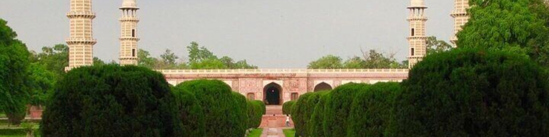 Emperor Jahangir's tomb, a single storey structure, square in plan, consists of a platform with tall octagonal corner towers and a projecting entrance bay in the middle of each side. The exterior of the monument including the lowest stage of the towers, has a red sandstone facing with rich panel decoration inlaid with marble decorative motifs. The interior is embellished with floral frescoes, delicate inlay work and brilliant marble intersia of various colours. The marble cenctaph with its delicate and colourful pietra dure is engraved with the ninety-nine attributes of God.
The tomb was also enriched with precious stones which were removed, like many other places in Lahore associated with Muslim historic sites, by the Sikhs in the 18th century.
This UNESCO World Heritage Site was built by Jahangir's son Shah Jahan who buried his father here according to his will in the 16th century.