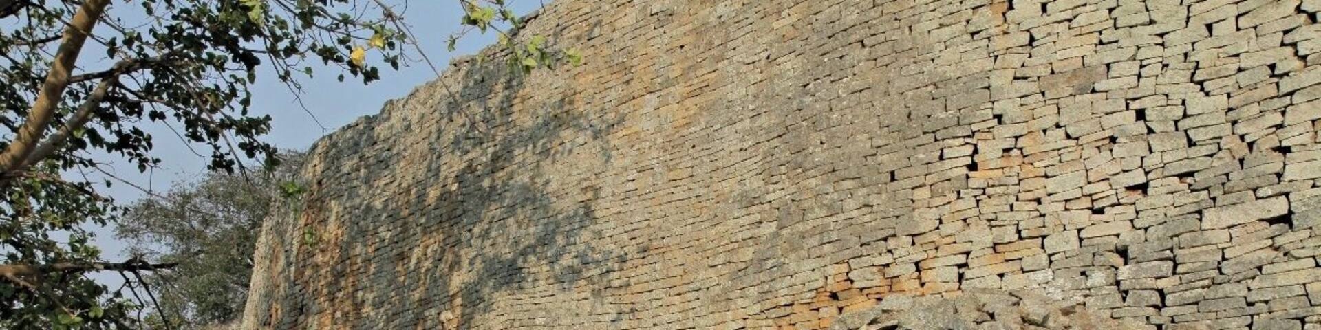 Close to the small city Masvingo in Zimbabwe you find the origin to the name Zimbabwe got in 1980. The name was already used by african nationalists around 1960 as a possible name for the country the day they got their freedom. The name comes from shona language and means ruins. In 1986 this amazing place was proclaimed a Unesco World Heritage Site. This is an amazing place and a must visit if you are in Zimbabwe.
Read more at: http://www.travelwithallsenses.com/great-zimbabwe-unesco-world-heritage-site/