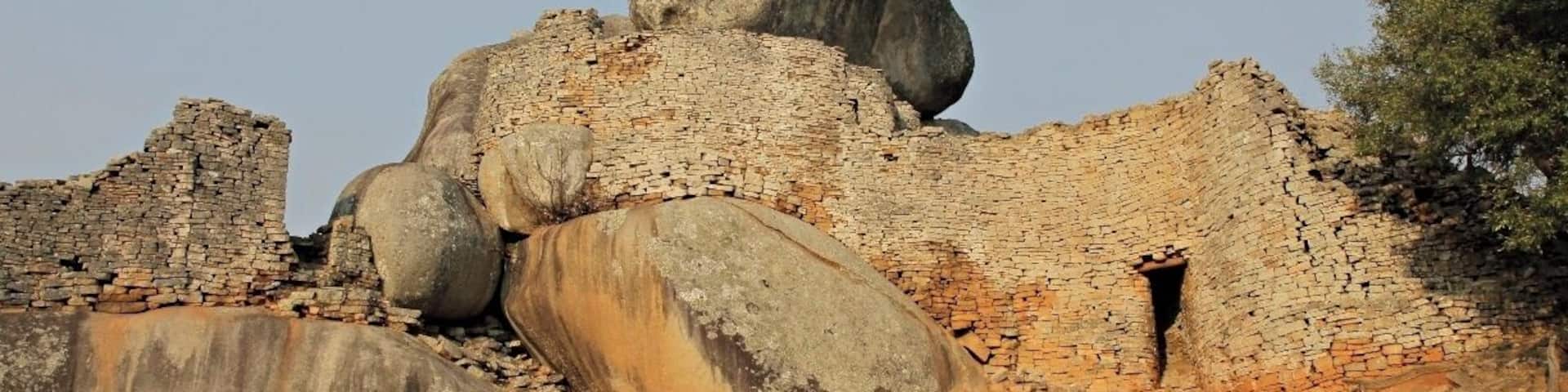 Close to the small city Masvingo in Zimbabwe you find the origin to the name Zimbabwe got in 1980. The name was already used by african nationalists around 1960 as a possible name for the country the day they got their freedom. The name comes from shona language and means ruins. In 1986 this amazing place was proclaimed a Unesco World Heritage Site. This is an amazing place and a must visit if you are in Zimbabwe.
Read more at: http://www.travelwithallsenses.com/great-zimbabwe-unesco-world-heritage-site/