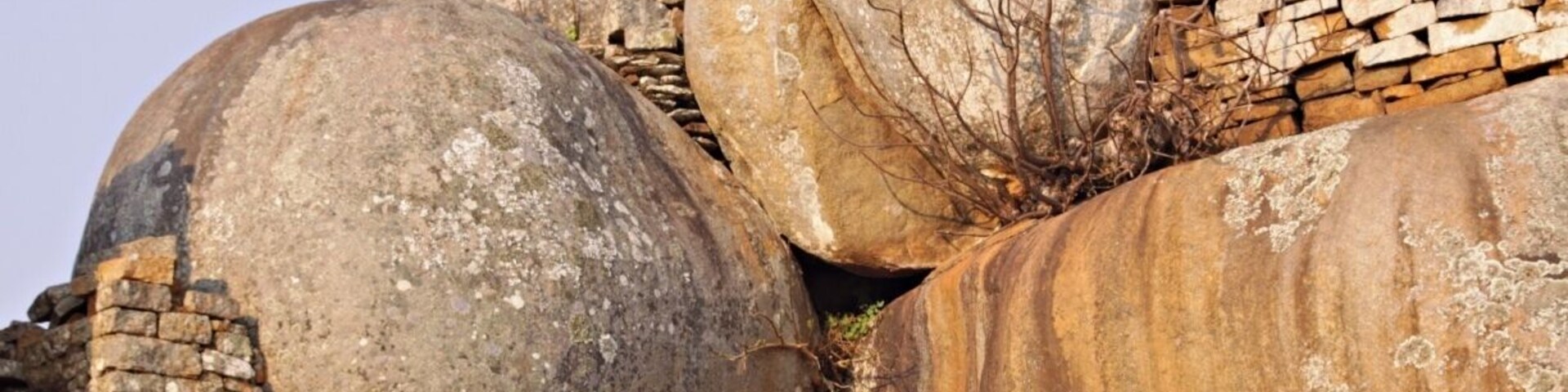 Close to the small city Masvingo in Zimbabwe you find the origin to the name Zimbabwe got in 1980. The name was already used by african nationalists around 1960 as a possible name for the country the day they got their freedom. The name comes from shona language and means ruins. In 1986 this amazing place was proclaimed a Unesco World Heritage Site. This is an amazing place and a must visit if you are in Zimbabwe.
Read more at: http://www.travelwithallsenses.com/great-zimbabwe-unesco-world-heritage-site/