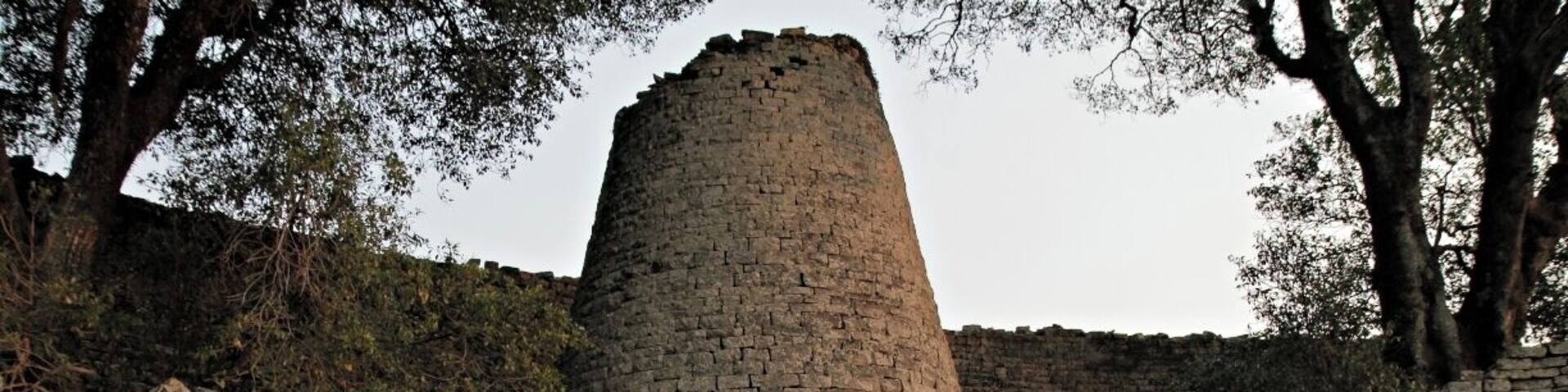 Close to the small city Masvingo in Zimbabwe you find the origin to the name Zimbabwe got in 1980. The name was already used by african nationalists around 1960 as a possible name for the country the day they got their freedom. The name comes from shona language and means ruins. In 1986 this amazing place was proclaimed a Unesco World Heritage Site. This is an amazing place and a must visit if you are in Zimbabwe.
Read more at: http://www.travelwithallsenses.com/great-zimbabwe-unesco-world-heritage-site/