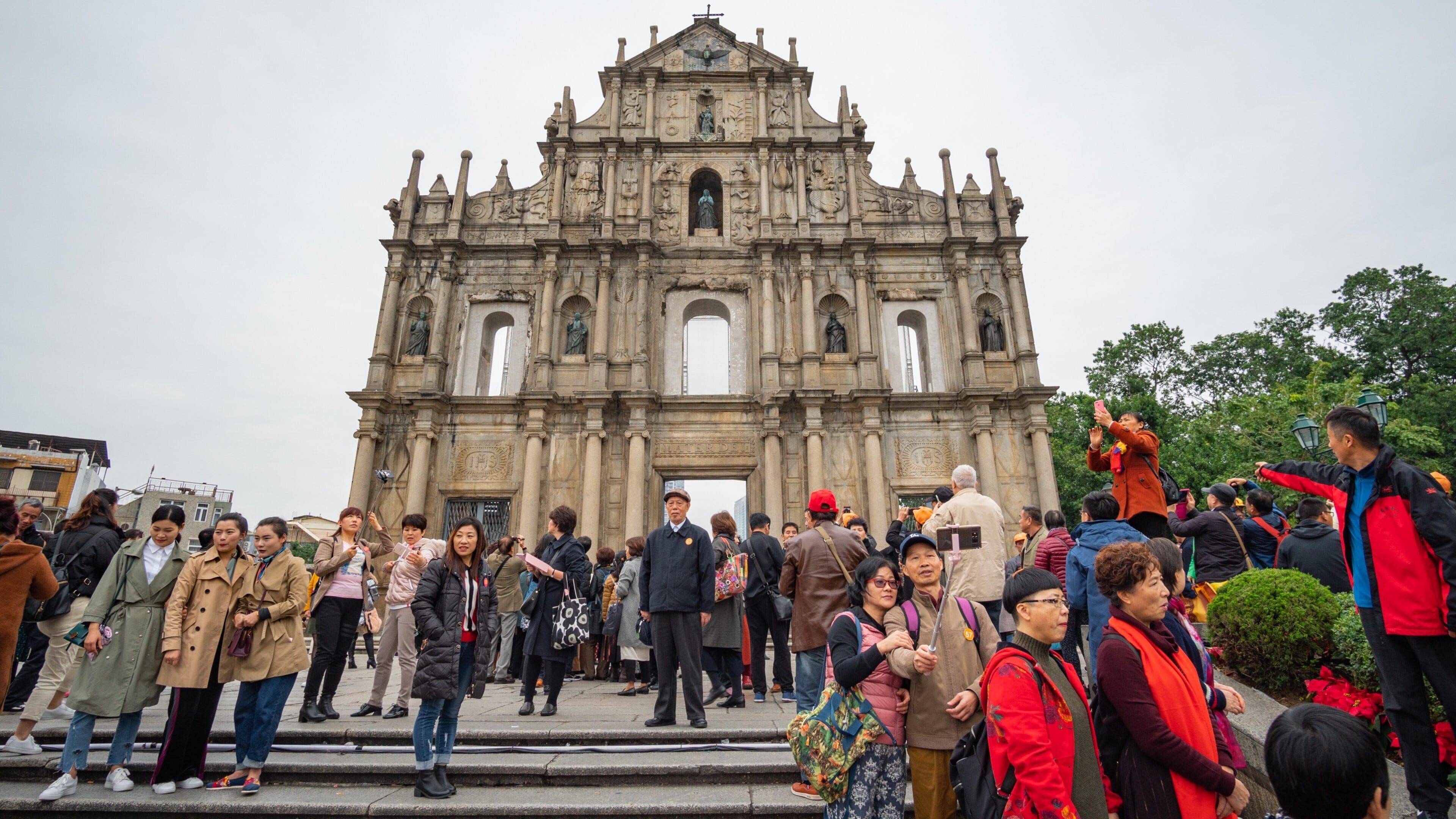 Ruins of St. Paul\'s Cathedral showing a church or cathedral, heritage elements and street scenes
