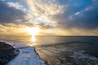 Aerial winter sunny frozen day view of snowy resort Palanga, Lithuania