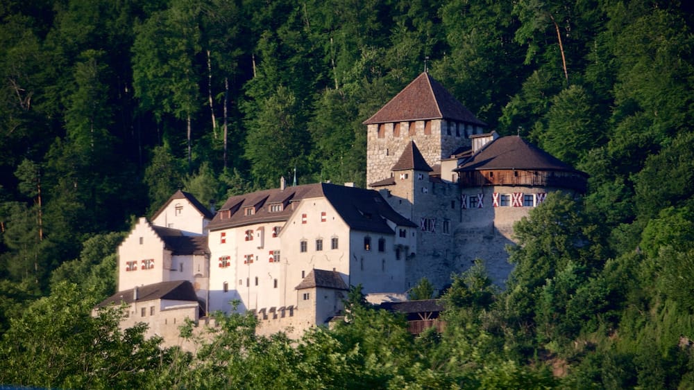 Vaduz Castle showing heritage architecture, forests and château or palace