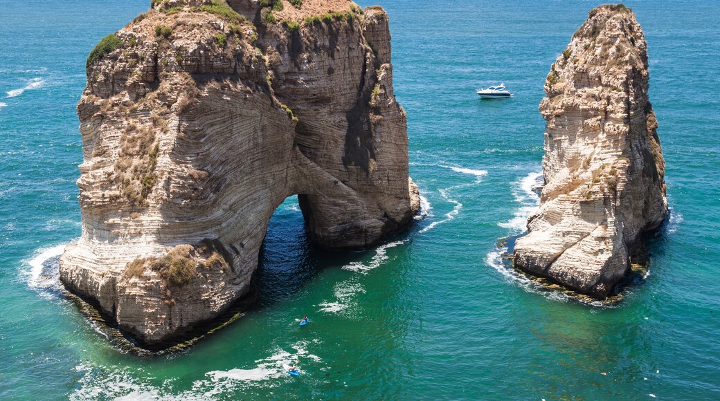 Pigeons' Rock limestone island in Beirut, Lebanon. City landscape of Beirut - capital of Lebanon. Beirut landmarks and famous places.; Shutterstock ID 252149104