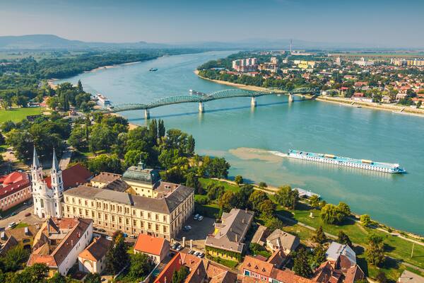 View of the Hungarian historic town from the basilica in Esztergom, the Danube river and the border bridge to the town of Sturovo in Slovakia.
