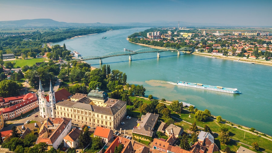 View of the Hungarian historic town from the basilica in Esztergom, the Danube river and the border bridge to the town of Sturovo in Slovakia.