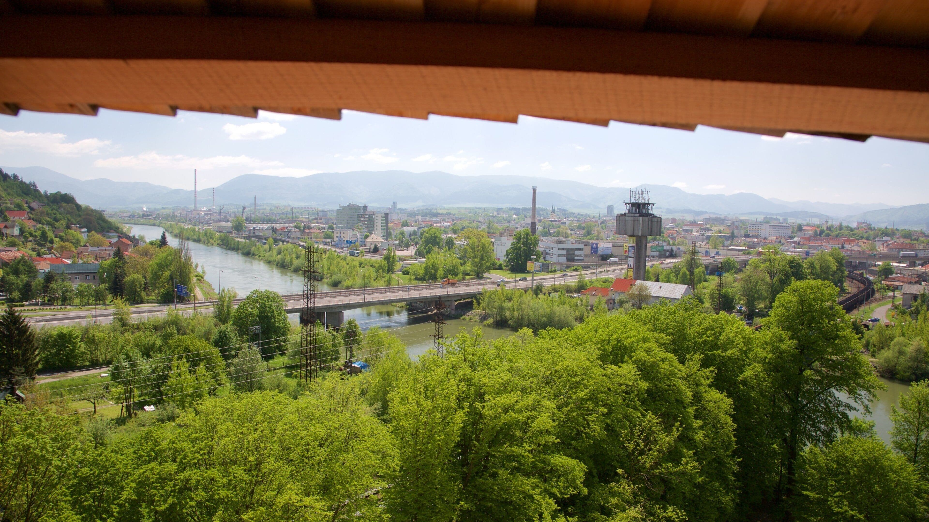 Budatin Castle which includes a river or creek and a city