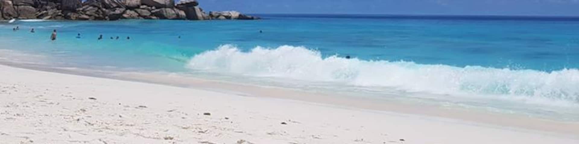 Oh Seychelles!!!
First you take the bike down to Grand Anse on the southeast side of La Digue. Next you take the small trail along the beach and then follow the rocky climb over the hill. On the other side lies beautiful Petite Anse; a beautiful beach with less visitors and amazing azur waters along its white sand.
As the above suggests - its a bit of a cycle to get there, with MANY hills but oh my goodness is it worth it!
#LifeatExpedia
#Beaches