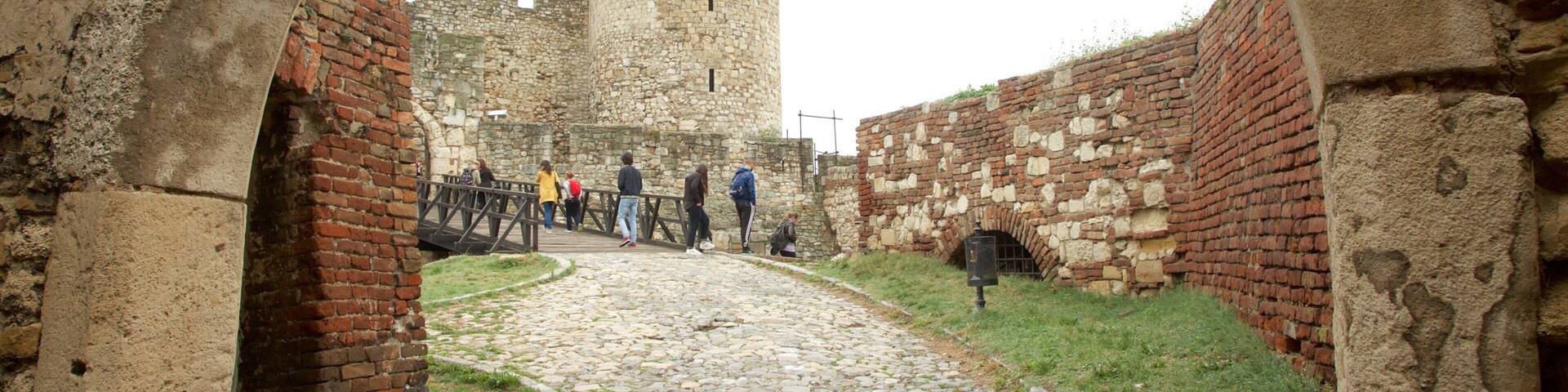 Kalemegdan Citadel featuring a bridge and heritage elements as well as a small group of people