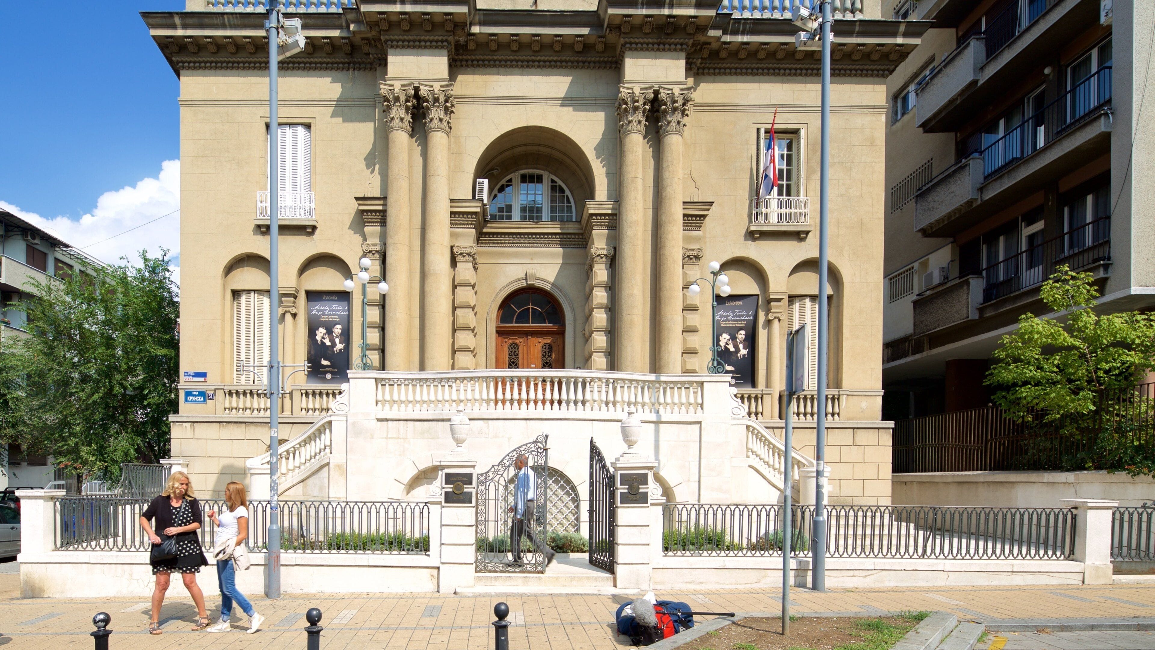Cathedral of Saint Sava featuring a church or cathedral and heritage architecture as well as a small group of people