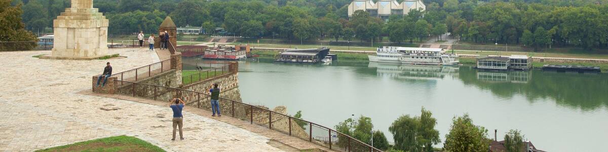 Pobednik which includes boating, a monument and a skyscraper