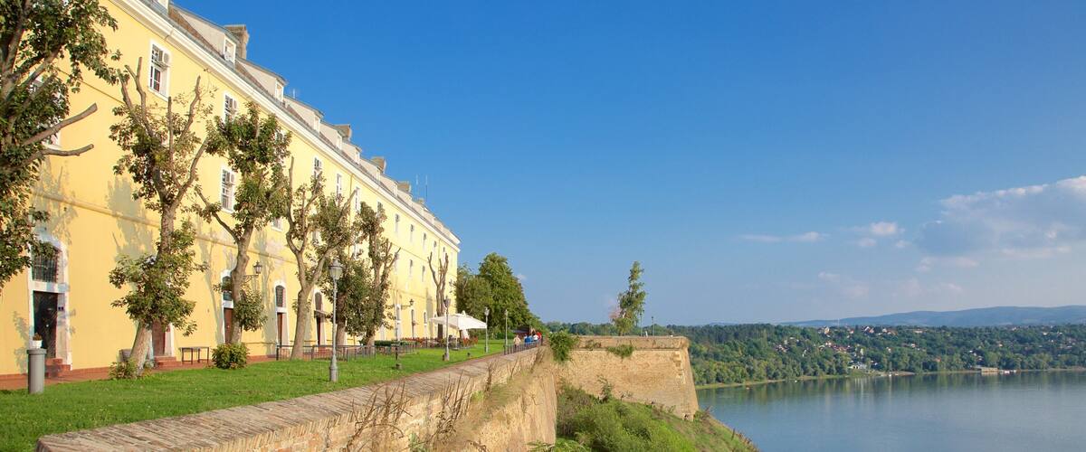 Petrovaradin Fortress featuring a river or creek and heritage architecture