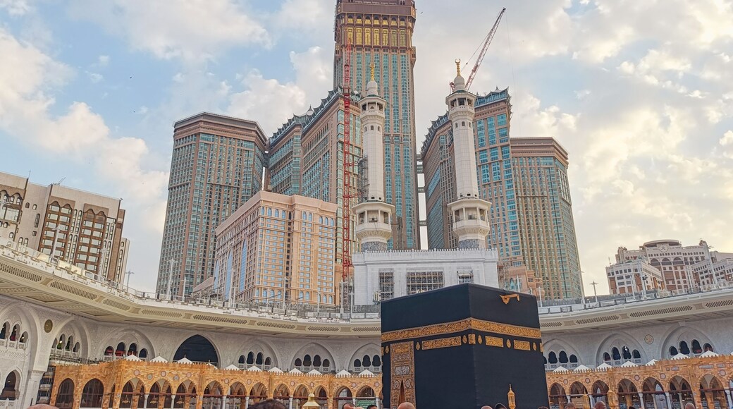The Kaaba in the day with the Clock Tower in the background