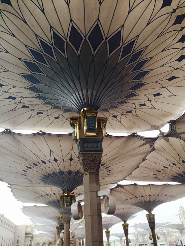 Huge umbrellas to protect from the heat and blazing sun in the courtyard of the mosque.