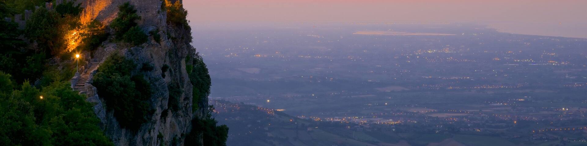 Guaita Tower featuring heritage elements, a sunset and tranquil scenes