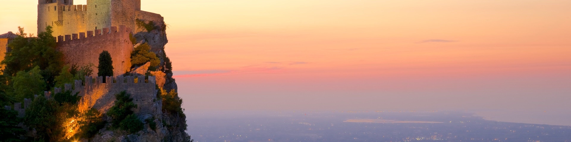 Guaita Tower featuring heritage elements, a sunset and tranquil scenes
